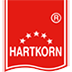 Logo von Hartkorn Gewürzmühle, weiße Schrift auf rotem Wappen.